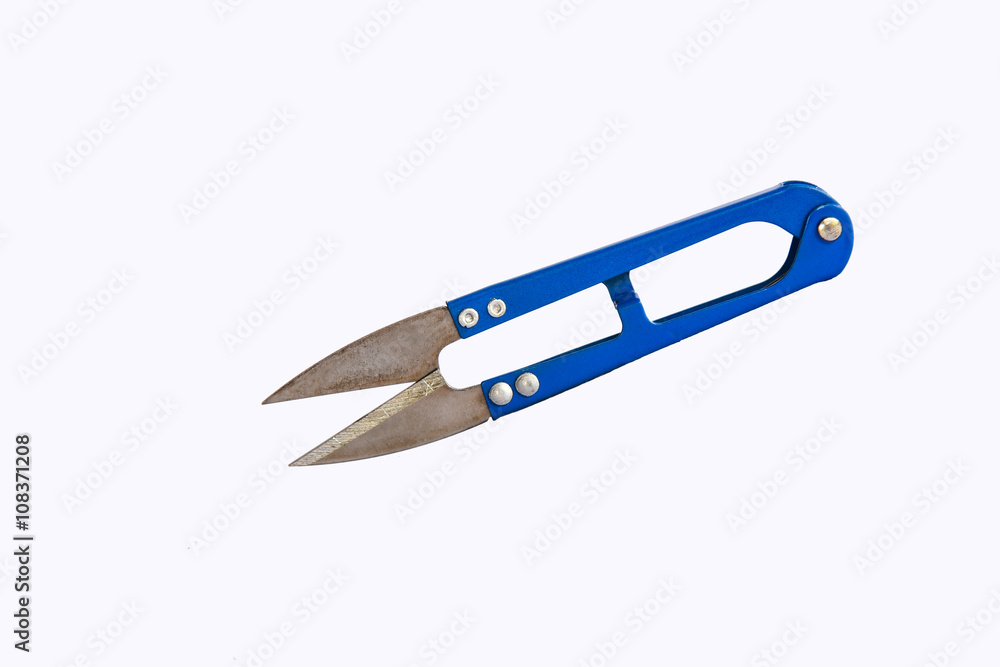 Old scissors for cut the thread on white background. Old scissors for cut the thread on white background.