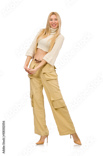 Pretty woman in beige trousers isolated on white