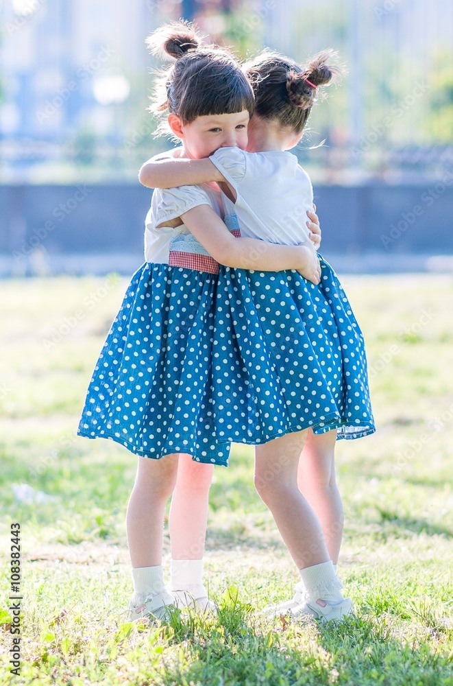 Twins hugging Twins hugging