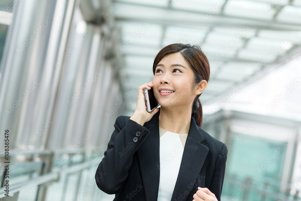 Businesswoman chat on mobile phone Businesswoman chat on mobile phone