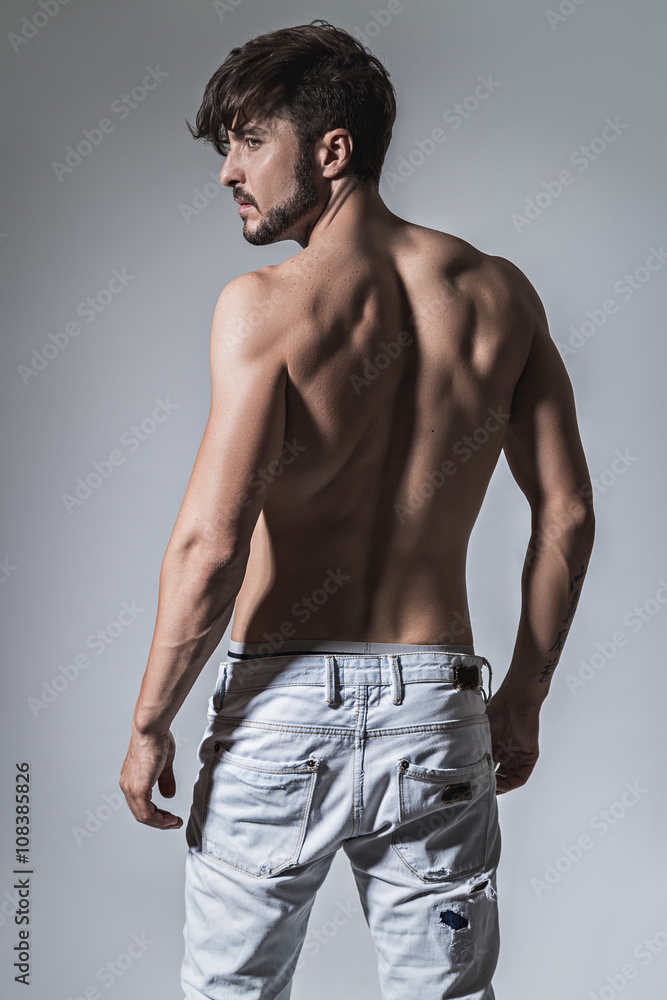 Muscled back of a fit man Muscled back of a fit man