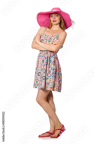 Girl in summer light dress and hat isolated on white