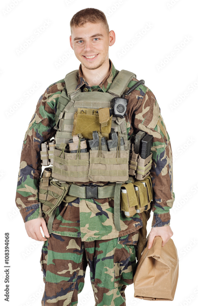 soldier wearing camouflage holding paper bag in his hand .war, army, weapon, technology and people concept. Image on a white background.