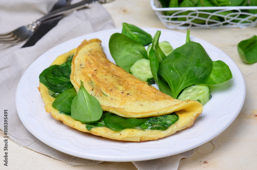 Omelette with spinach and cheese