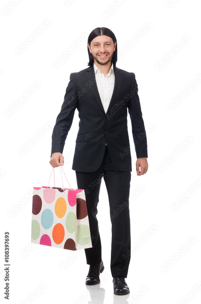Black suit man holding plastic bags isolated on white Black suit man holding plastic bags isolated on white