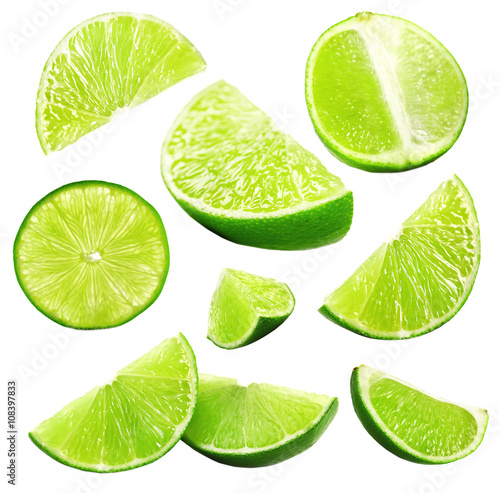 Falling limes isolated on white