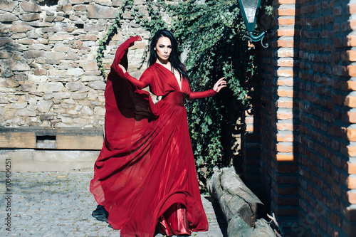 Woman in red dress outdoor