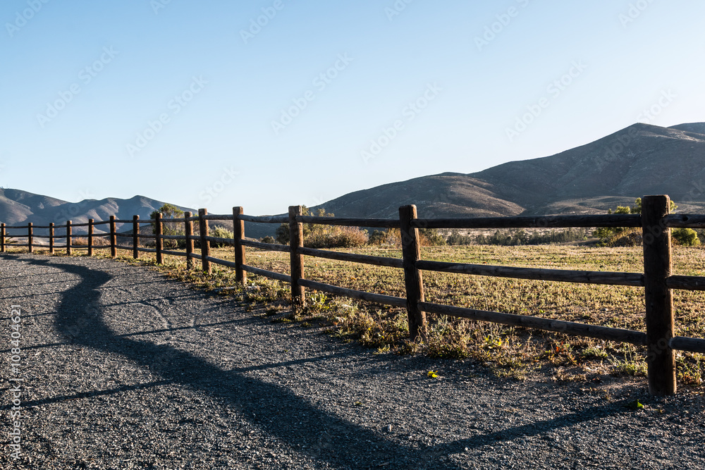 Mountain peak, fence, and pathway in Chula Vista, California. 