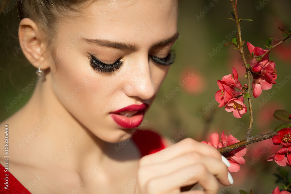 Woman with red blossom