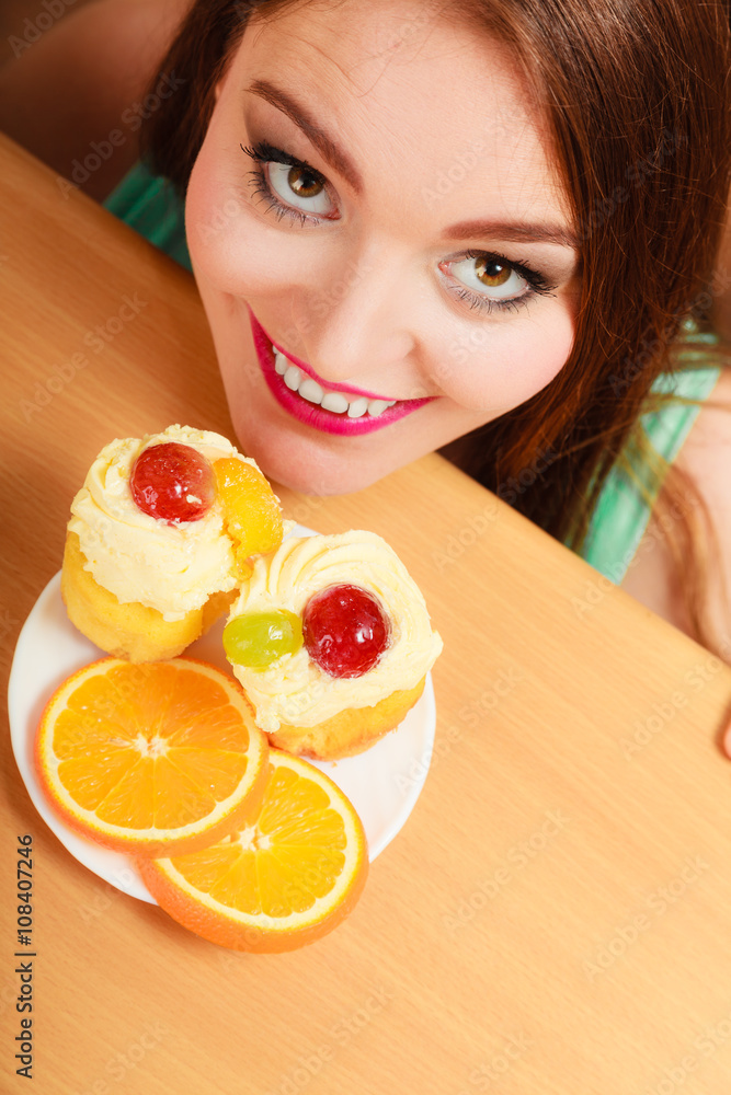 Woman looking at delicious sweet cake. Gluttony. Woman looking at delicious sweet cake. Gluttony.