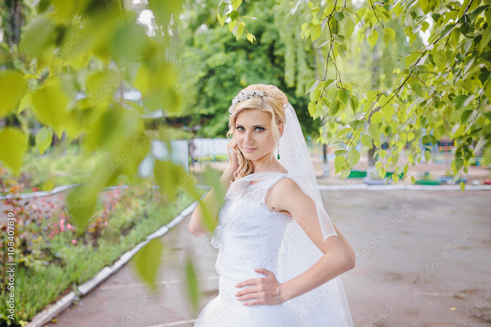 Photo beautiful bride outdoors in a forest. Photo beautiful bride outdoors in a forest.