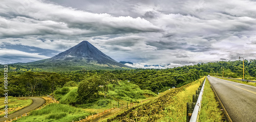 Panoramic view of Arenal Volcano during a cloudy day photo