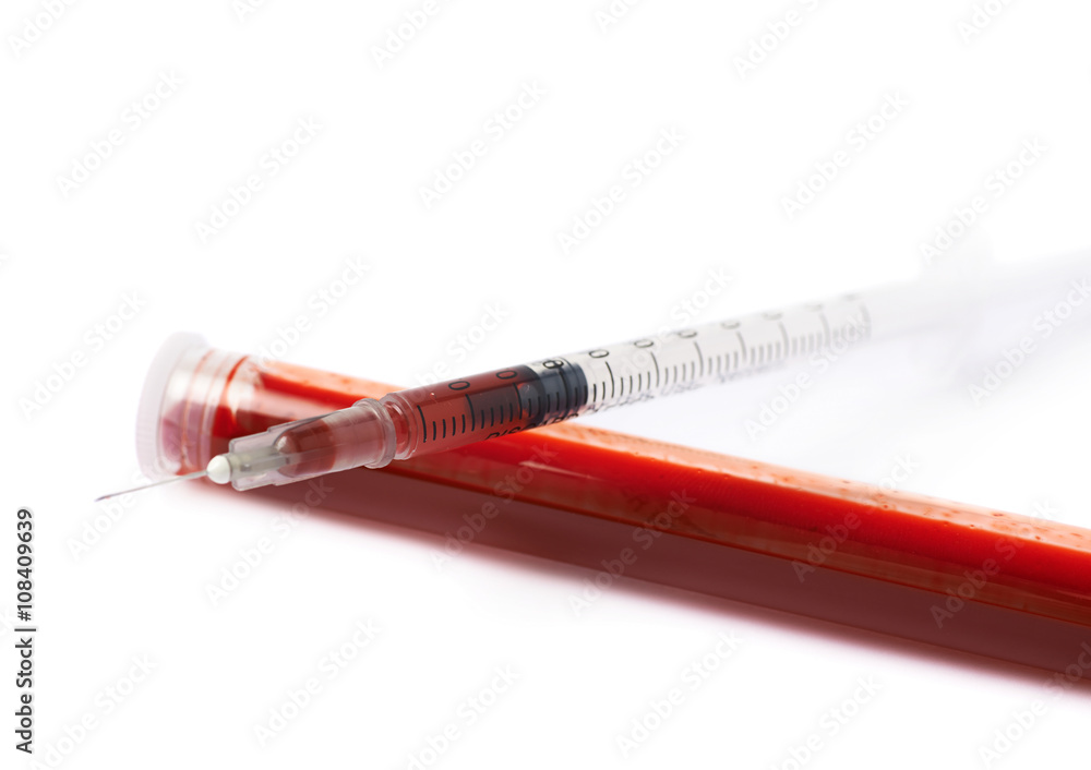 Fototapeta premium Medical syringe and test-tube isolated
