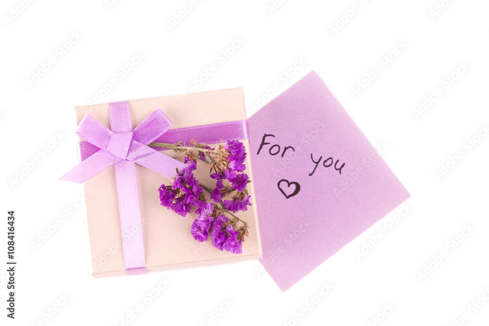 Gift box with purple ribbon bow, isolated on white Gift box with purple ribbon bow, isolated on white