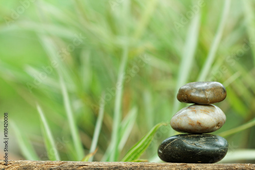 Tower stone with bamboo in the background. Concept of tranquility,peace and relaxing.