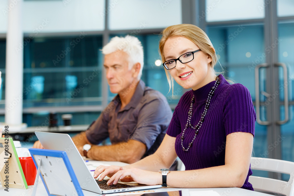 Co-workers working together