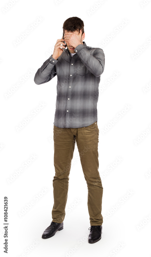 Caucasian man on the phone - confusing phone call Caucasian man on the phone - confusing phone call