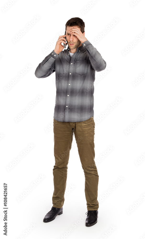Caucasian man on the phone - confusing phone call Caucasian man on the phone - confusing phone call