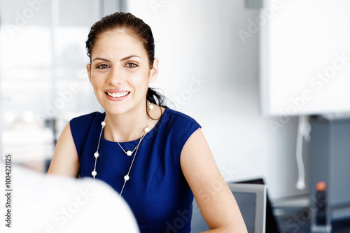 Businesswoman working in office Free Download Businesswoman working in office - GFXLoad