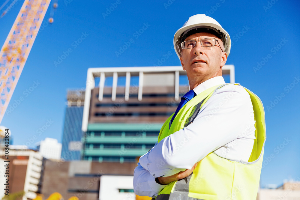 Engineer builder at construction site Engineer builder at construction site