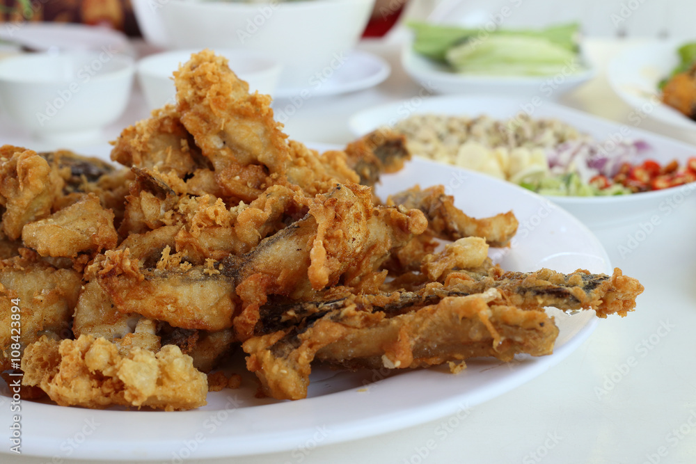 Complementing fish recipe - deep fried fish served with spices s Complementing fish recipe - deep fried fish served with spices s