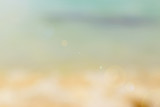 Abstract blurred ocean seascape background. Sandy beach with tur