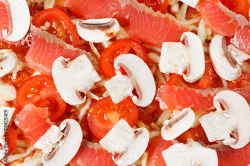 Cooking homemade pizza with...