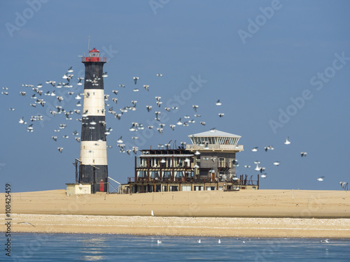 Der Leuchtturm am Pelican Point, mit der Pelican Point Lodge, Walvis Bay, Region Erongo, Namibia, Afrika photo