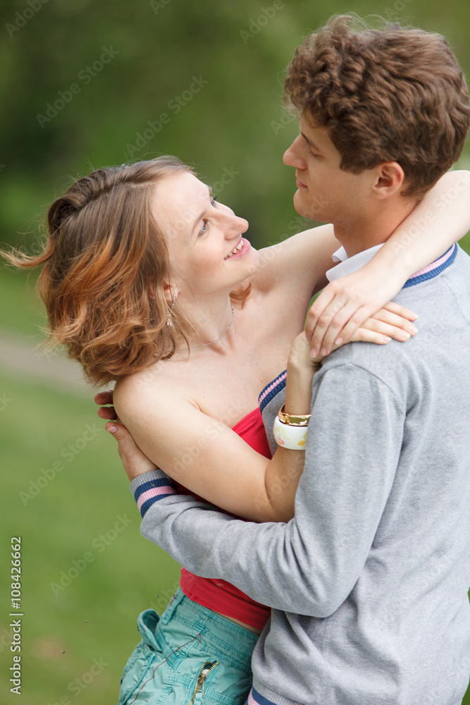 Young couple having fun in the park Young couple having fun in the park