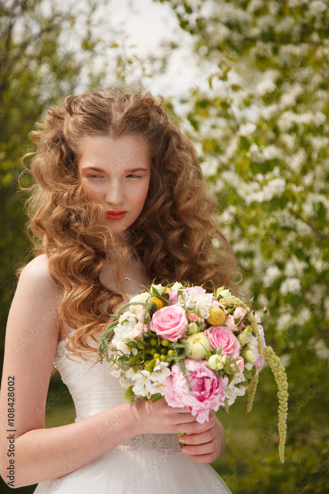 Young bride with flowers