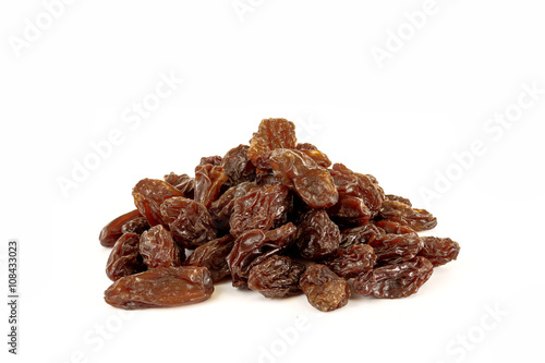 Raisins in white background.