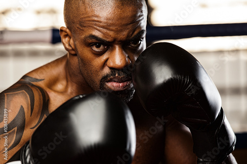 Sportsman kick boxer portrait after training © romanolebedev