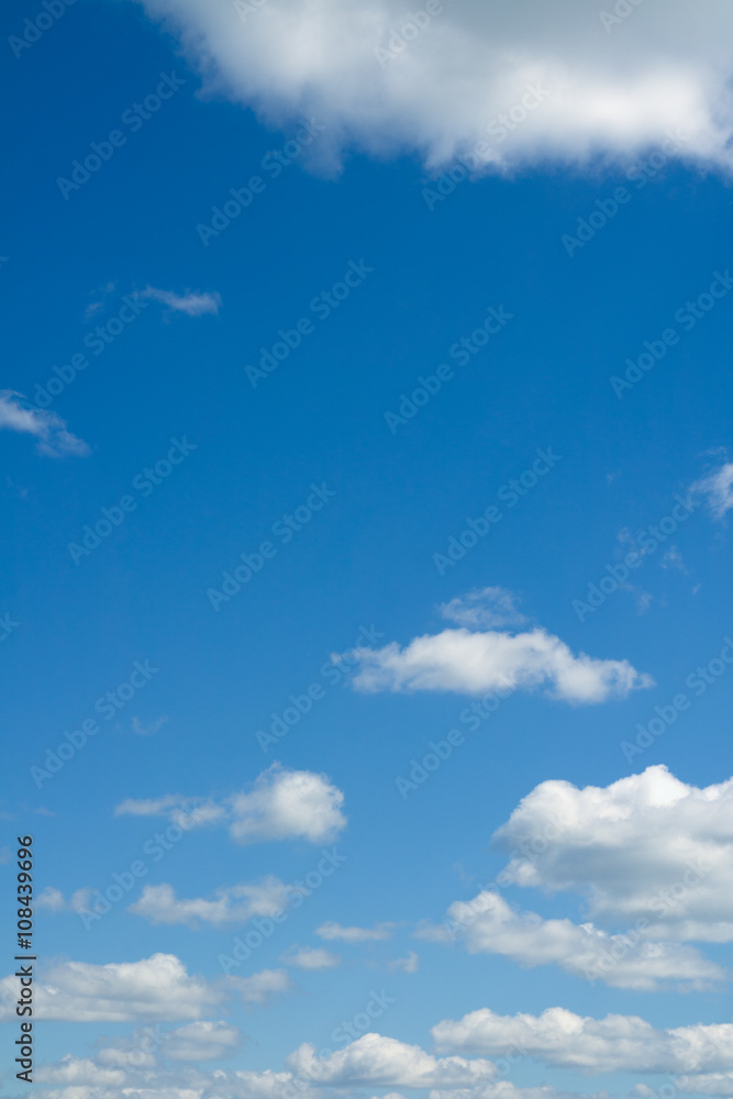 Obraz premium White heap clouds in the blue sky. Heaven.
