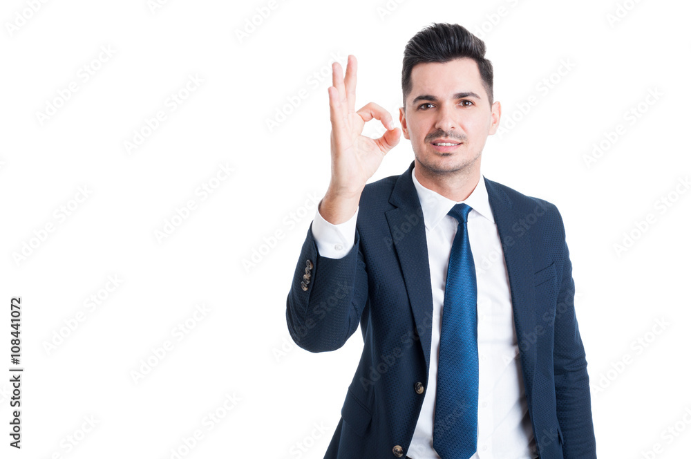 Sales man showing perfect or excellent gesture Sales man showing perfect or excellent gesture