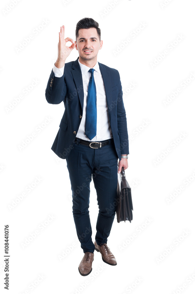Businessman showing excellent or perfect gesture standing Businessman showing excellent or perfect gesture standing