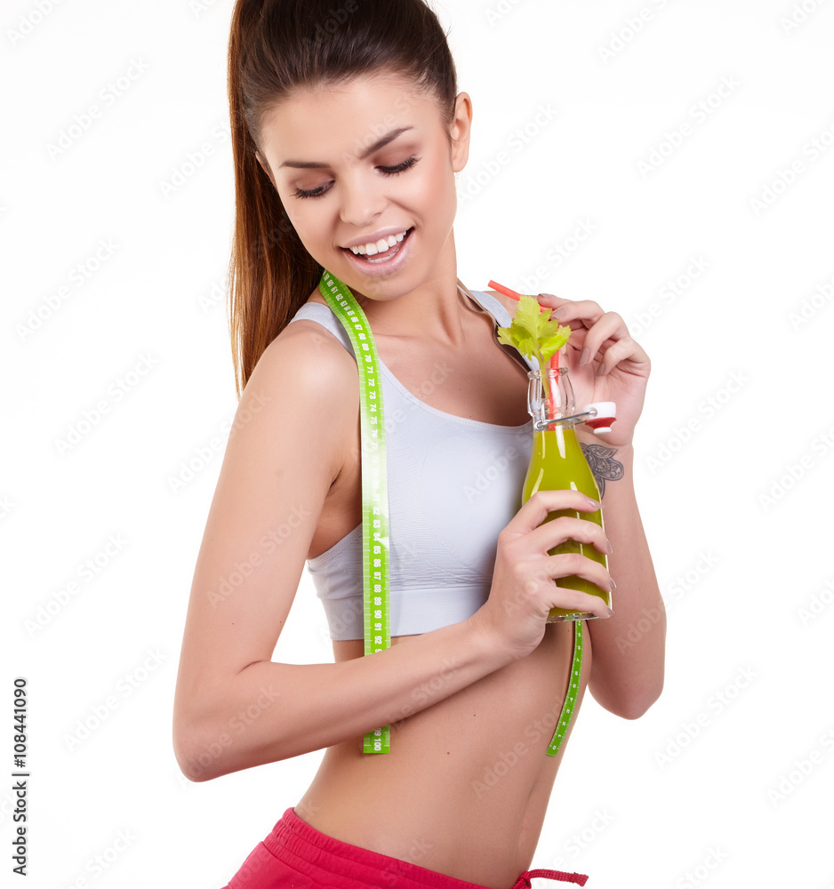 Slim Young Woman with perfect healthy fitness body with a tape m Slim Young Woman with perfect healthy fitness body with a tape m