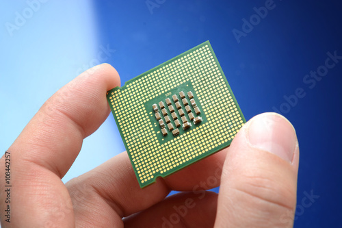 micro processor chip in hand