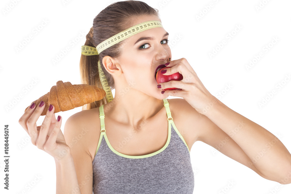 Fototapeta premium excited scared woman diet concept choosing eat apple