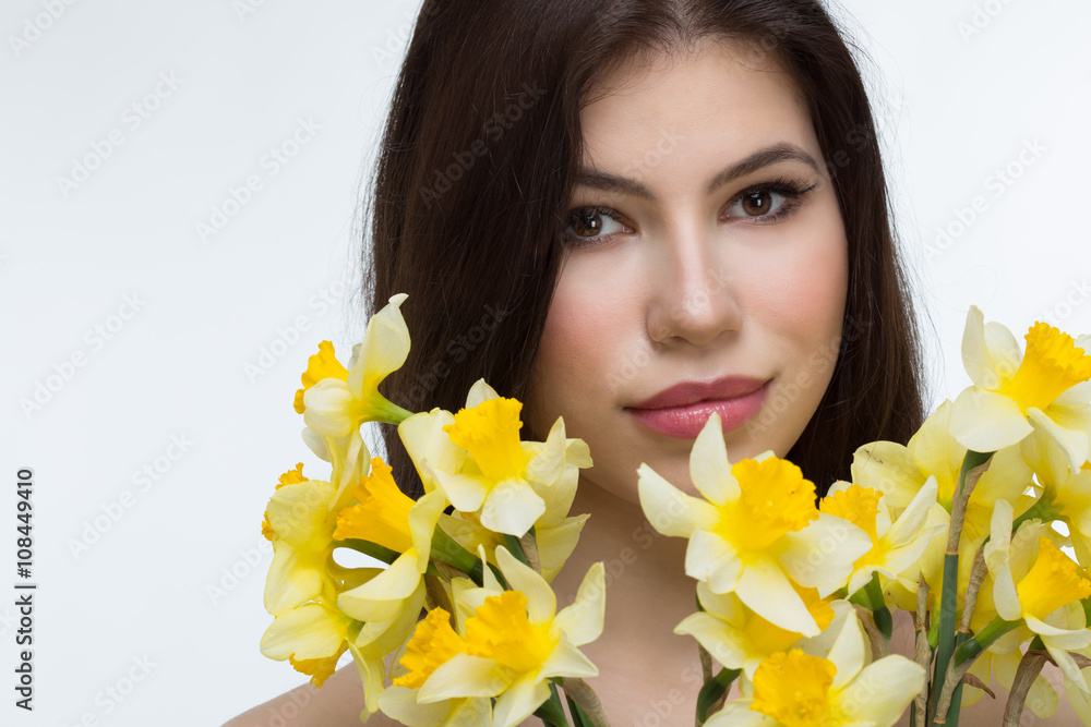 beautiful woman with daffodils beautiful woman with daffodils