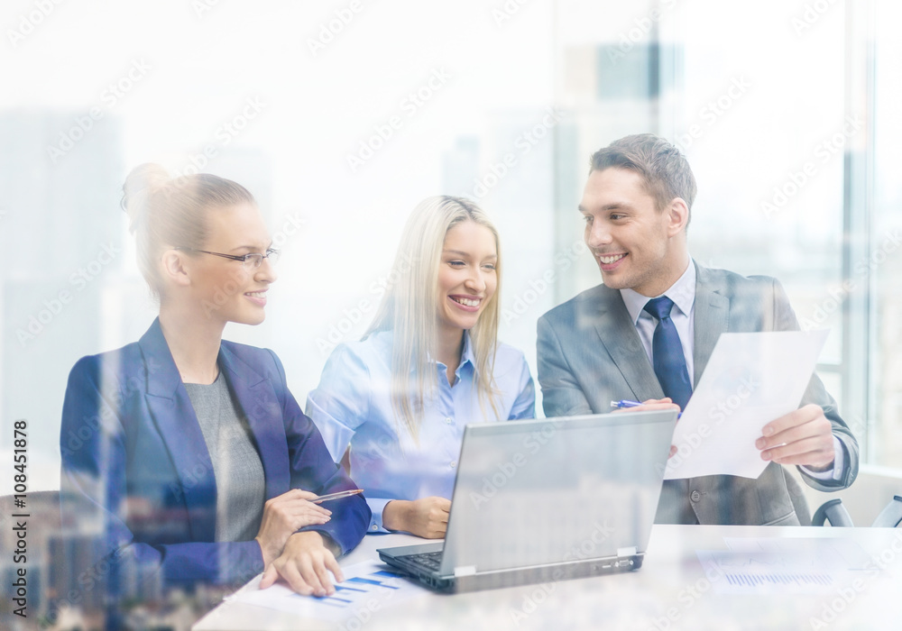 business team with laptop having discussion business team with laptop having discussion