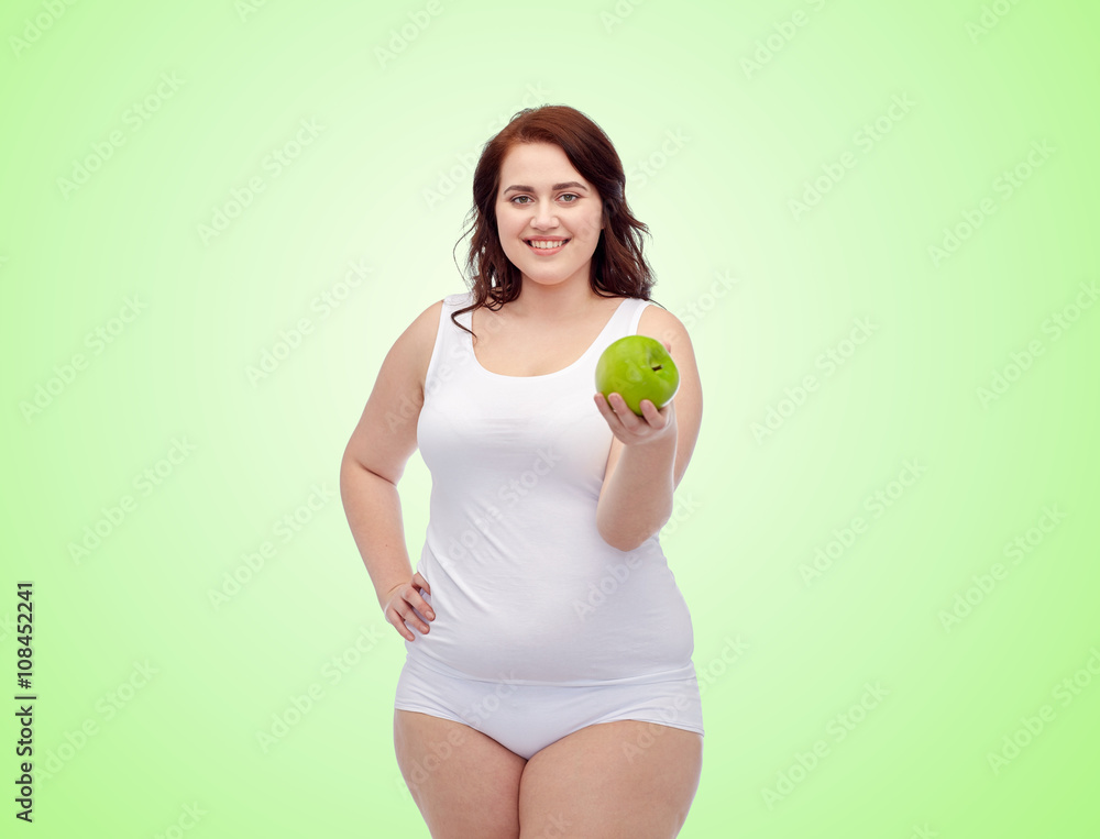 happy plus size woman in underwear with apple happy plus size woman in underwear with apple