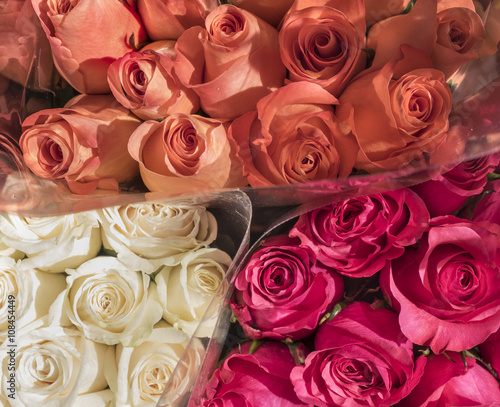 Bouquets of Roses  Bouquets of white  orange  and pink roses in a Manhattan market