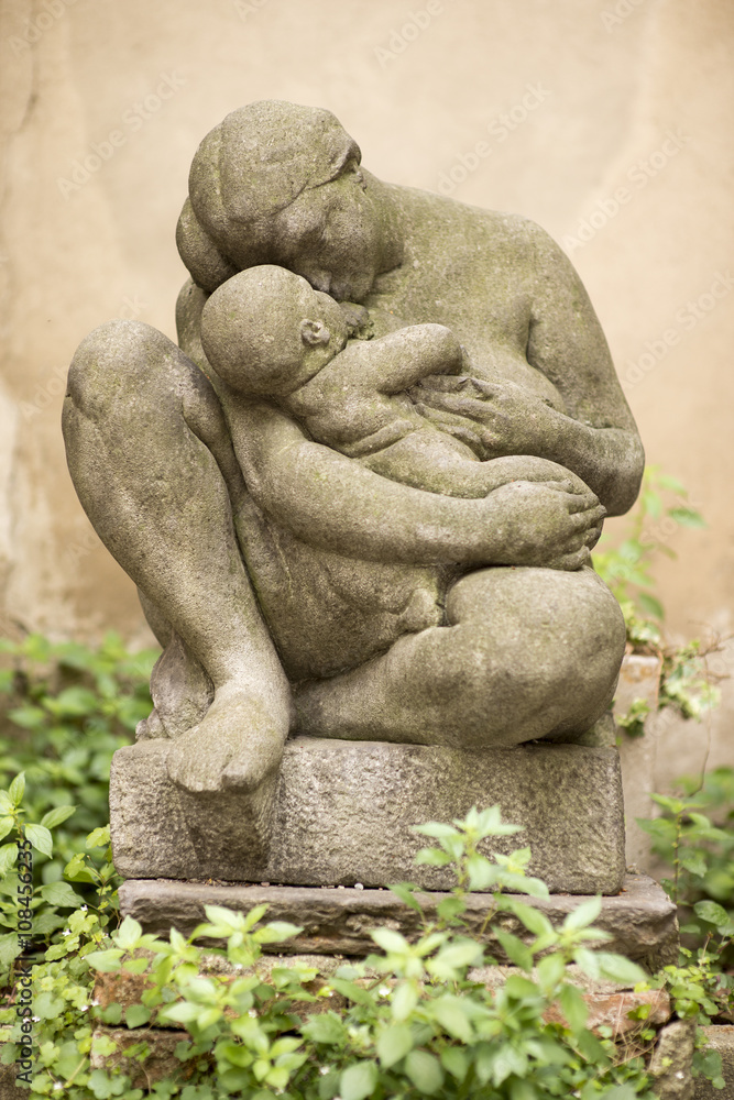 Stone statue representing motherhood
