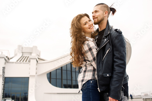 Young and happy couple having fun in the city