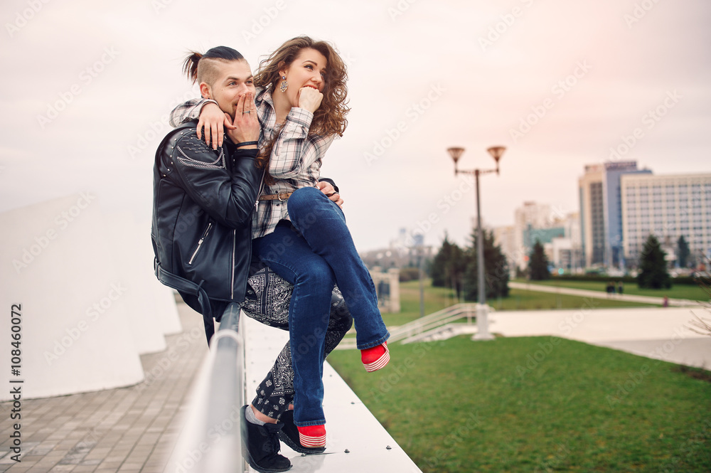 Young and happy couple having fun in the city