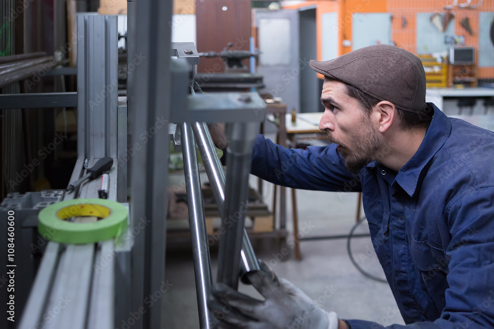 Side view of man taking measurement Side view of man taking measurement