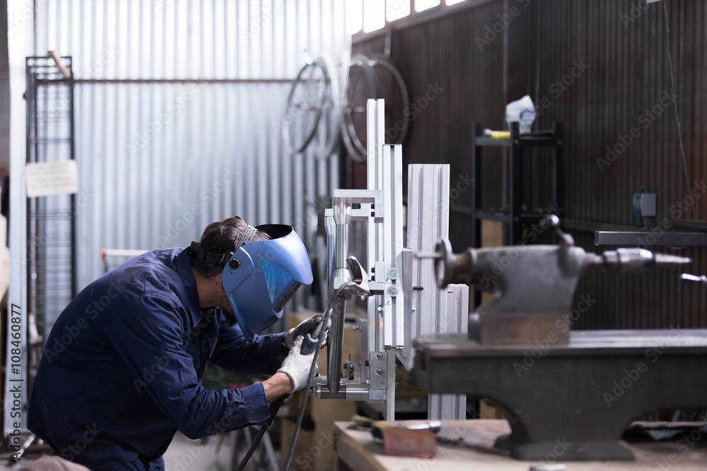 Unrecognizble man welding iron details Unrecognizble man welding iron details