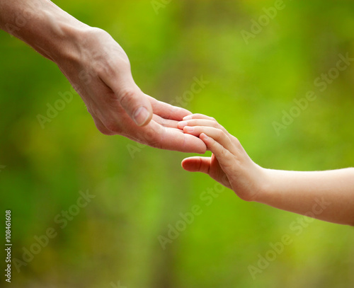 Father's and child's hands © Sk Elena