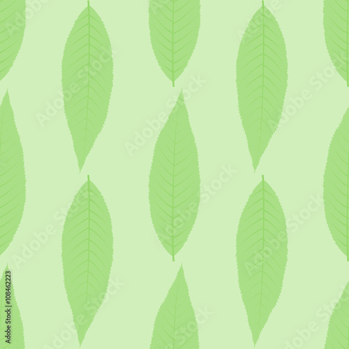 Symmetrical seamless background of green leaves