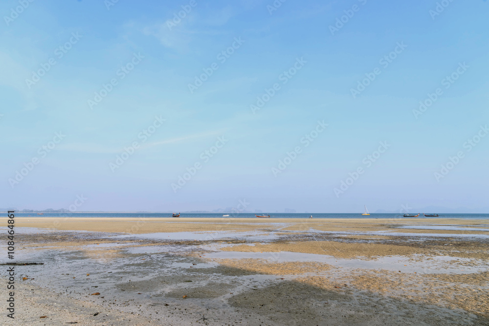 beach and sky when water down